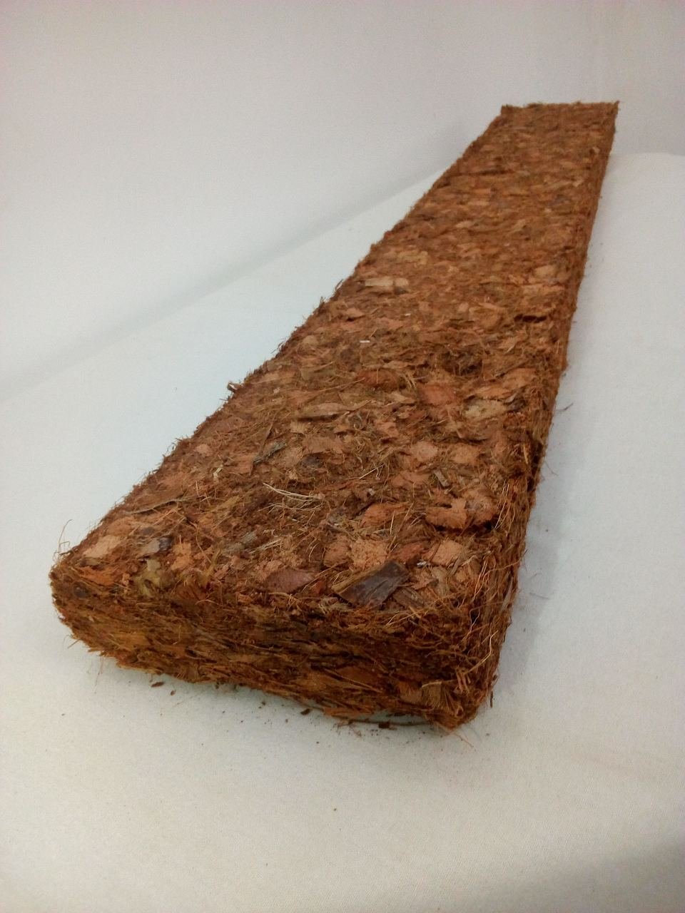 Compressed coco grow slab of coconut husk chips and coco peat